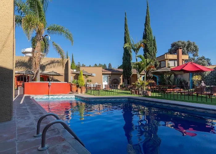 Capital O La Huerta Golf & Hotel