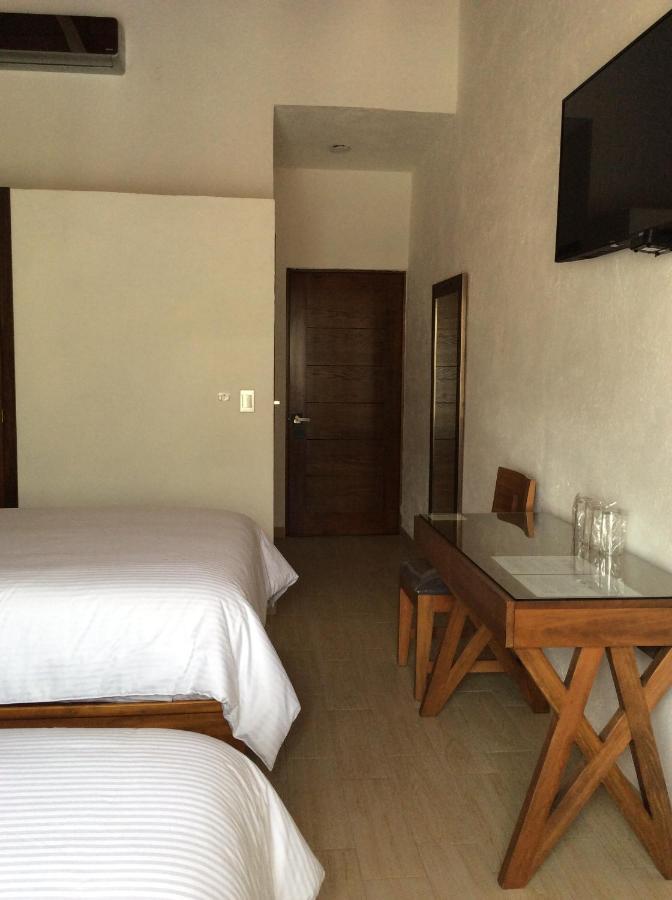 Concierge Flor Y Canto Hotel *