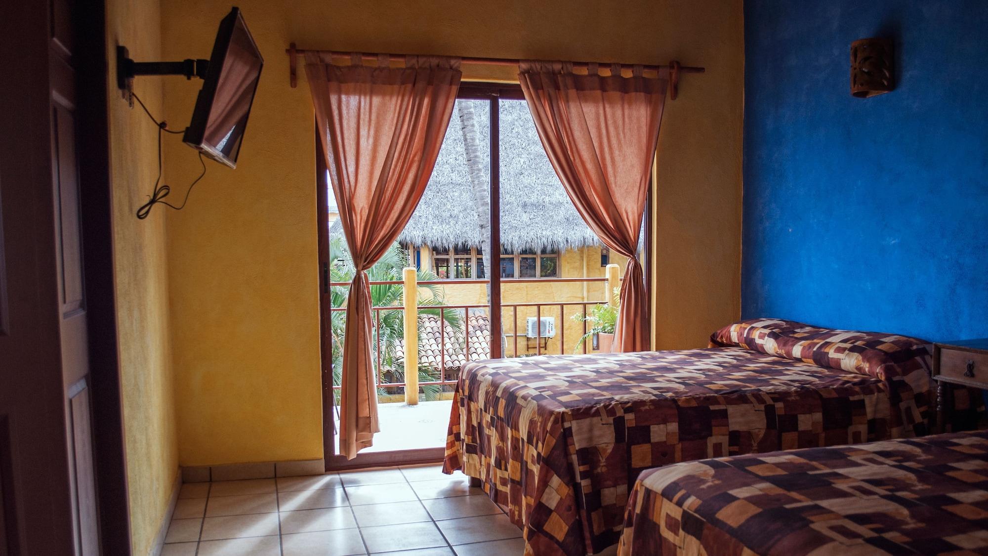 Cabanas Del Capitan Hotel