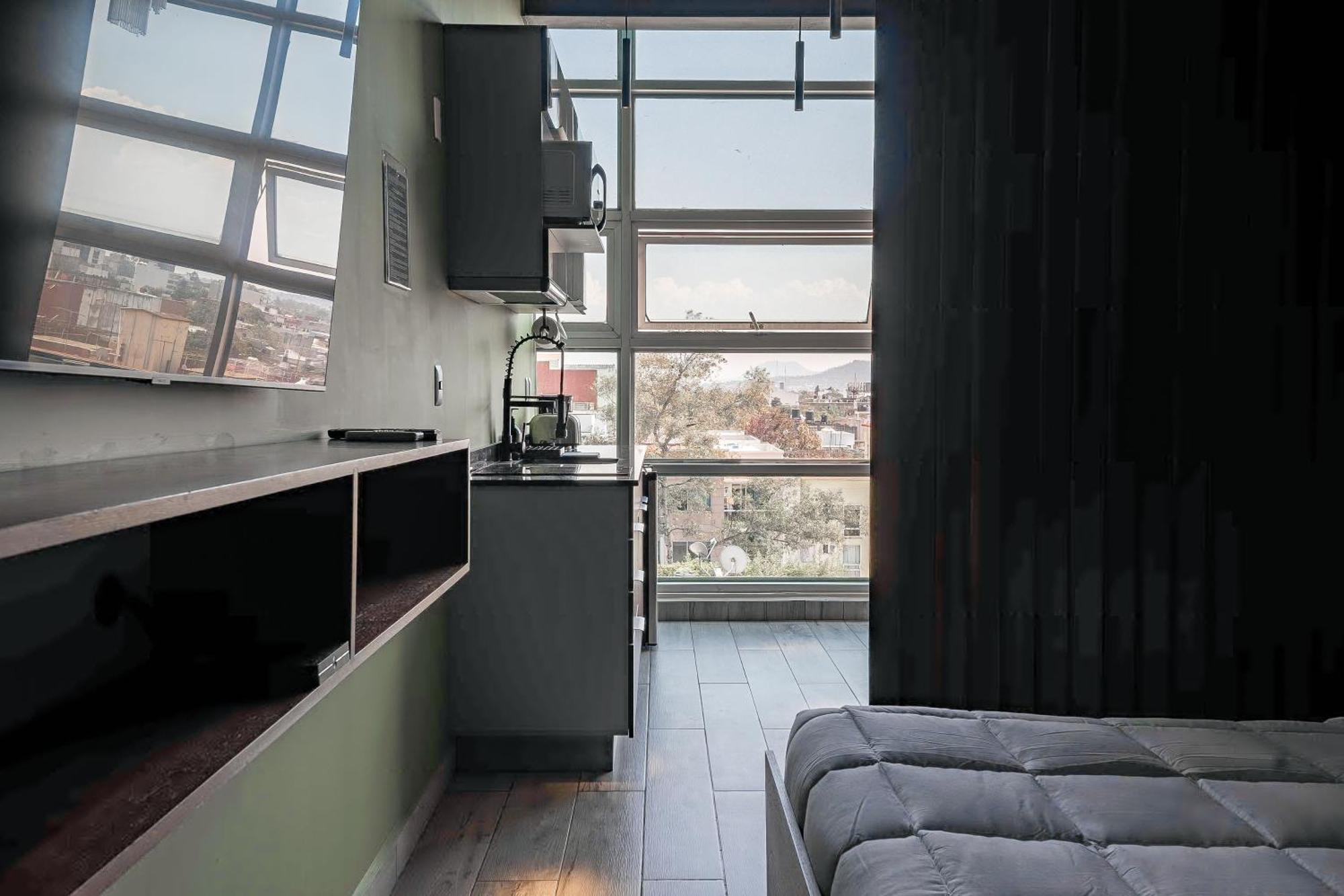 The Jungle Loft Tropical Comfort In A Centric Location With Kitchen Apartment