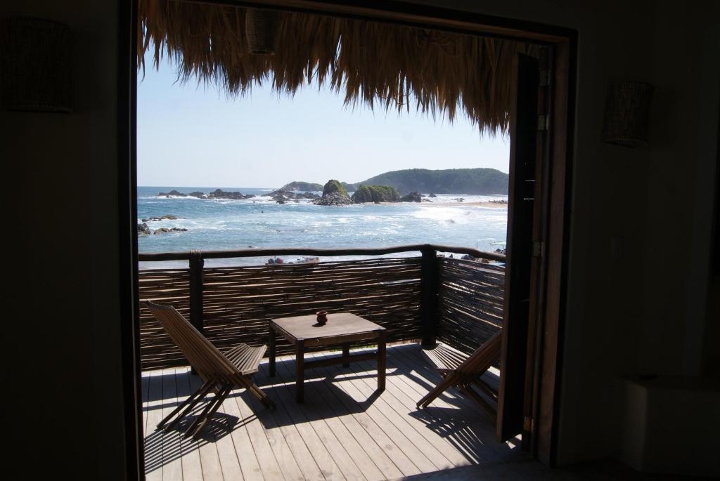 Y Pizzeria La Termita Hotel San Agustinillo