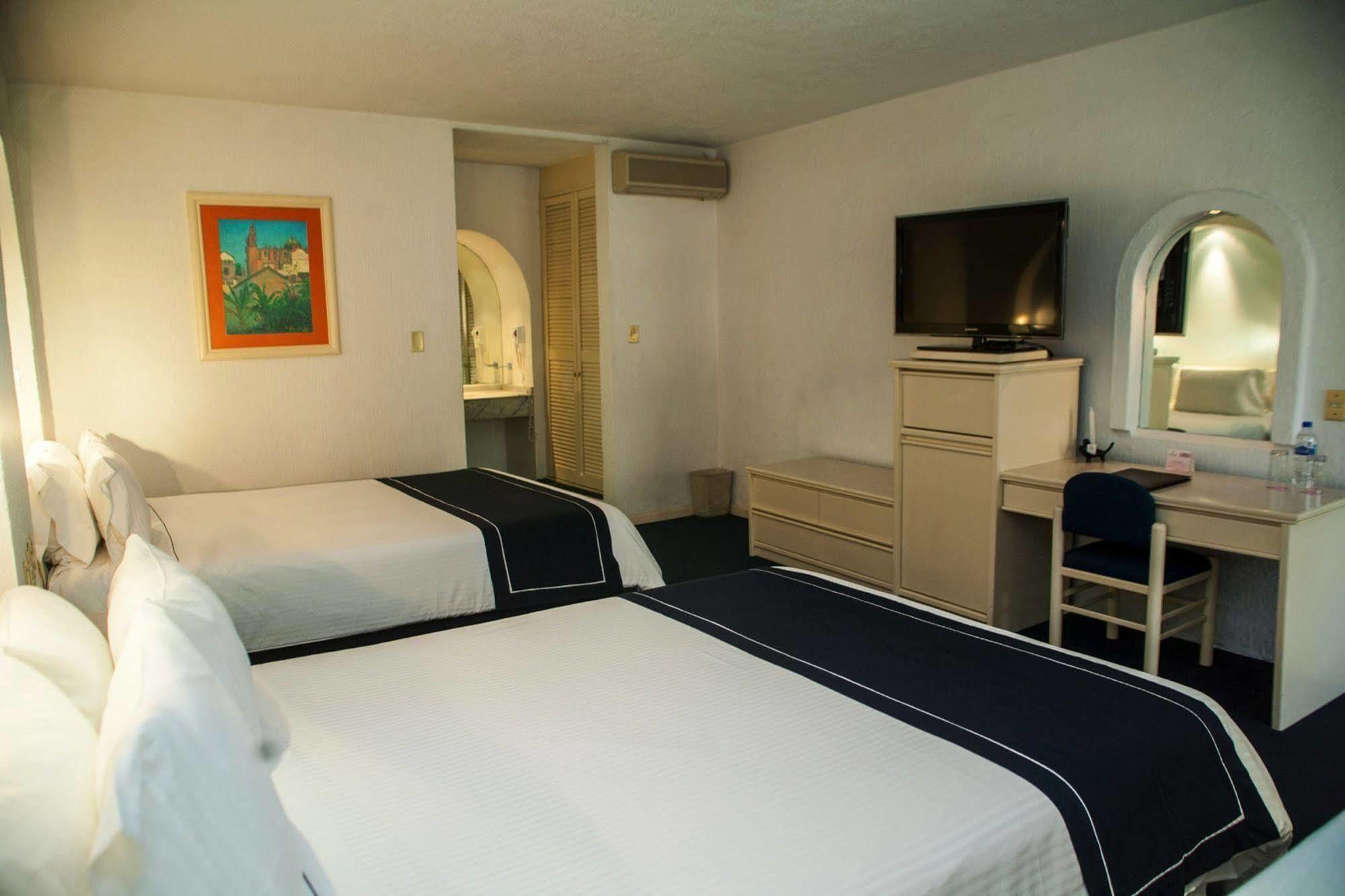 Hotel Mision De Angeles 4*